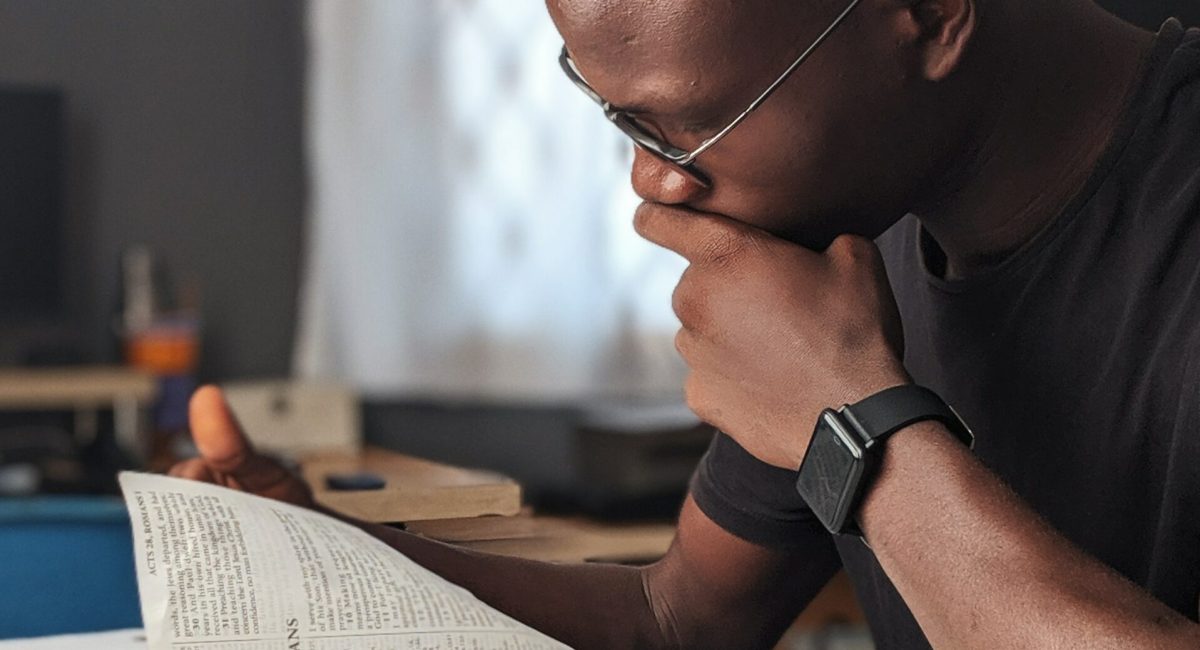 Man reading bible